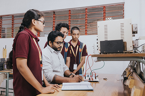 B.Tech Electronics and Communication Engineering students collaborating on project